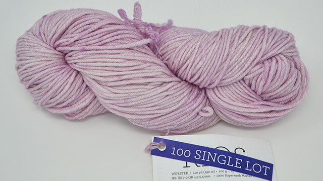 A photo of a skein of Malabrigo Rios yarn in light pink.